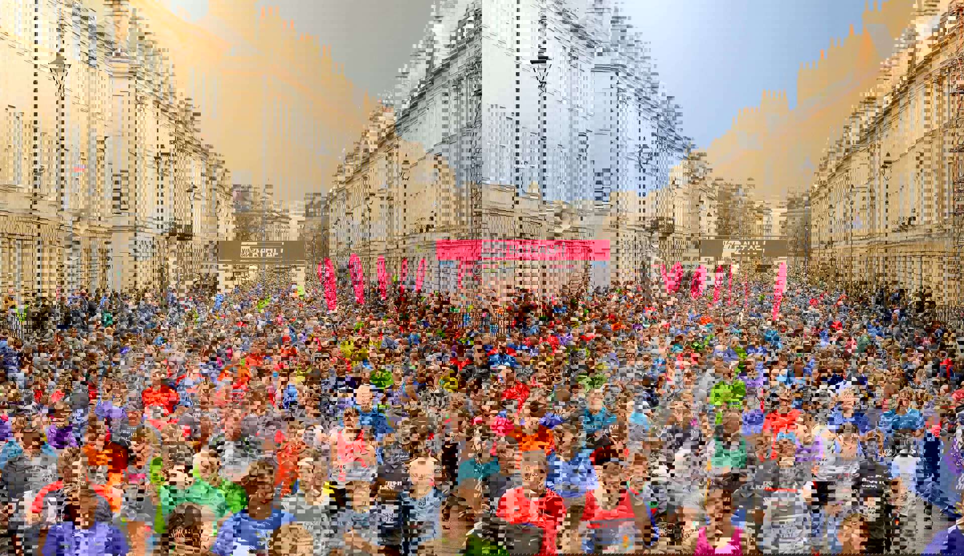 A very large group of runners through Bath