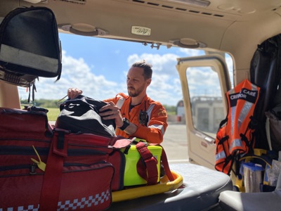 Dr Jono Holme replenishing an equipment bag in the Wiltshire Air Ambulance helicopter Dr Jono Holme replenishing an equipment bag in the Wiltshire Air Ambulance helicopter