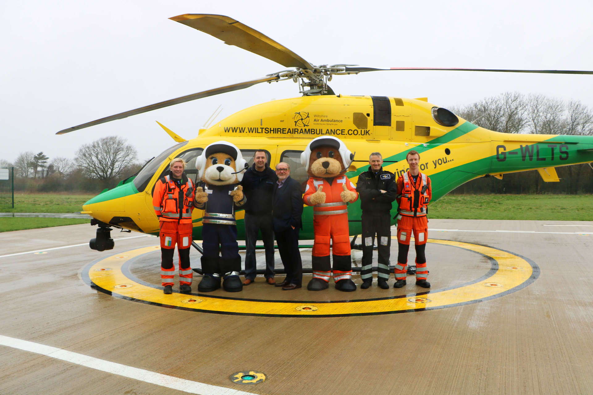 Mascot sponsor Soft Options photographed alongside two paramedics, a pilot and our two charity bear mascots Wilber and Marsha. Mascot sponsor Soft Options photographed alongside two paramedics, a pilot and our two charity bear mascots Wilber and Marsha.