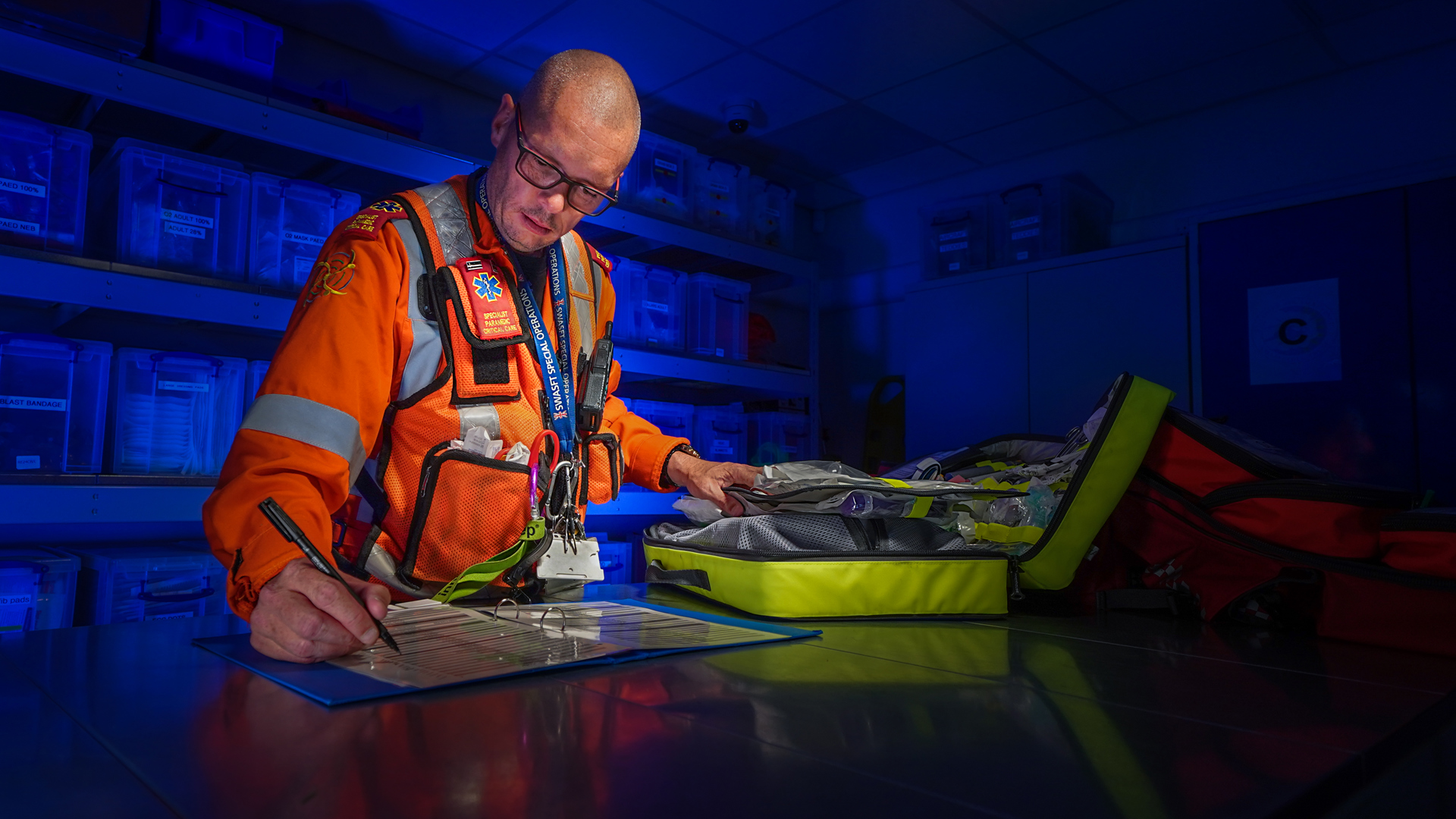 A paramedic working in the drugs store room at the airbase