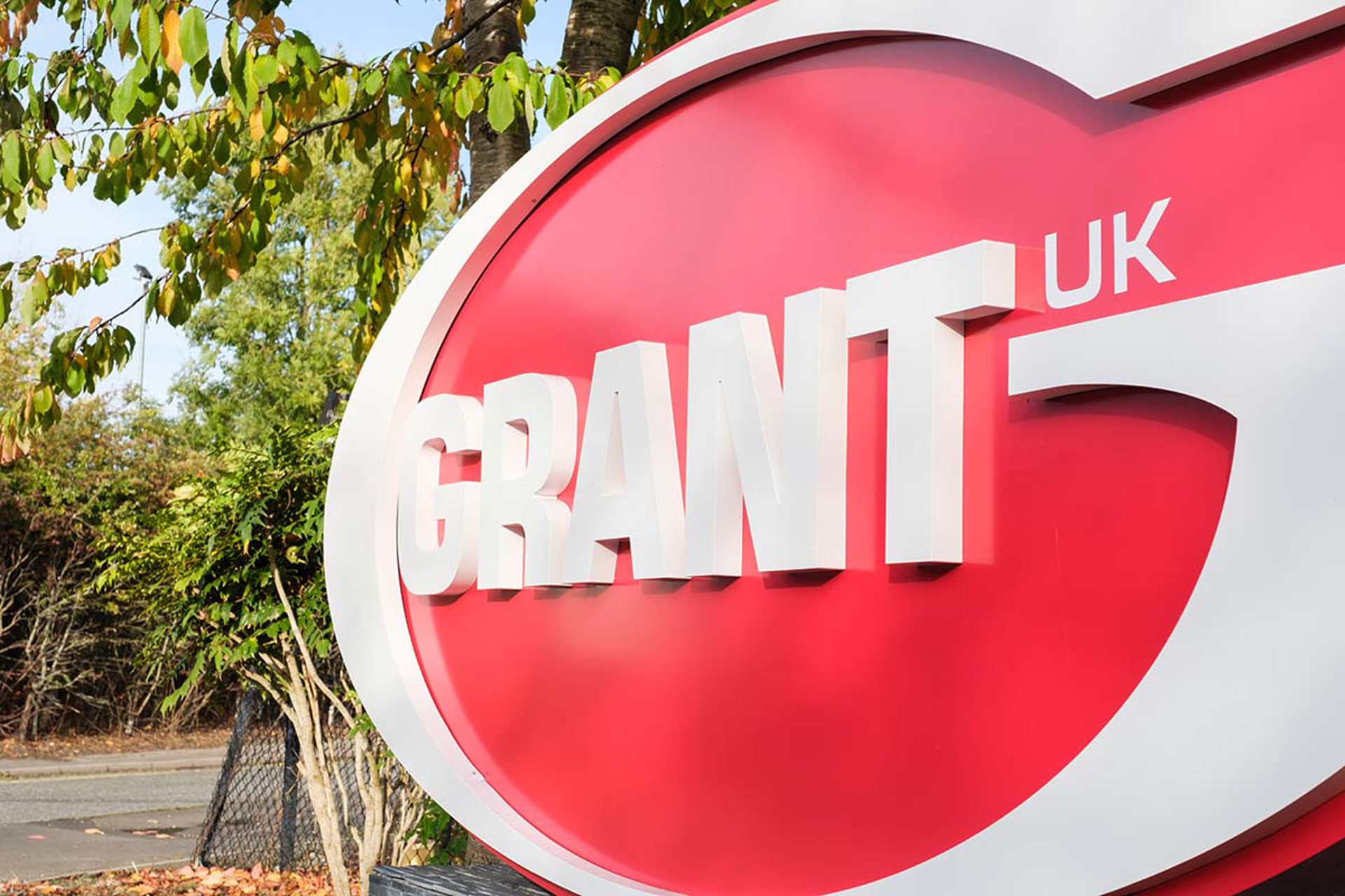 A red and white logo for Grant UK A red and white logo for Grant UK