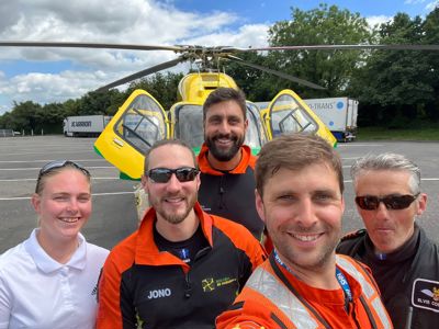A photo of a pilot, two paramedics, a doctor and an ambassador standing in front of the Wiltshire Air Ambulance helicopter A photo of a pilot, two paramedics, a doctor and an ambassador standing in front of the Wiltshire Air Ambulance helicopter