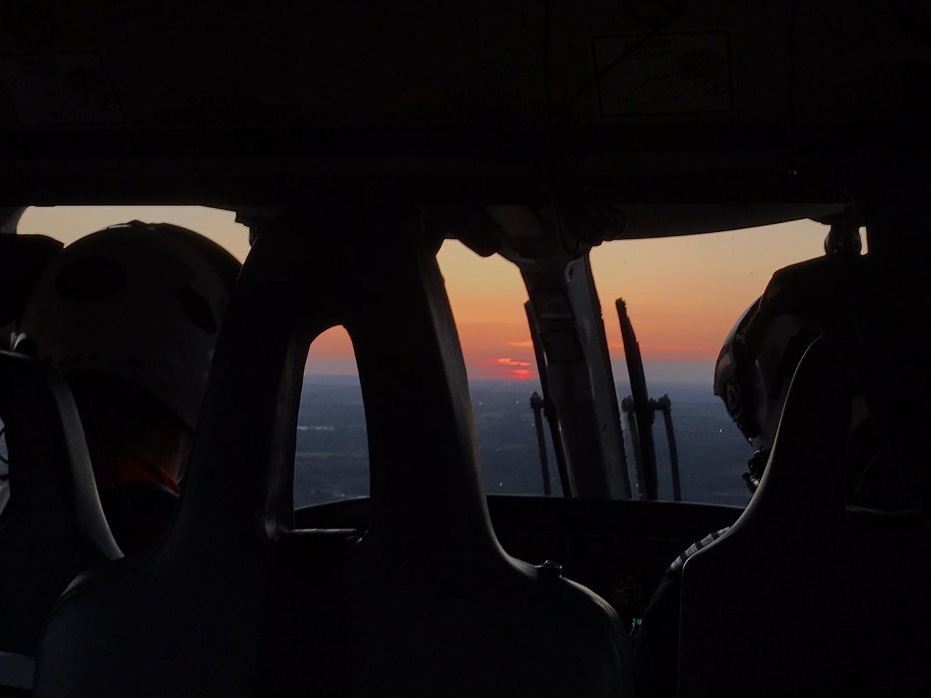 Sunset view from inside of a helicopter Sunset view from inside of a helicopter