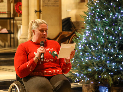 Louise Hunt-Skelley delivering a talk at our Christmas Carol Concert