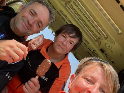 Pilot Matt Wilcock, Dr Maria Smith and Critical care paramedic Lou Cox with ice creams in the Wiltshire Air Ambulance helicopter Pilot Matt Wilcock, Dr Maria Smith and Critical care paramedic Lou Cox with ice creams in the Wiltshire Air Ambulance helicopter