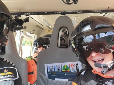 Pilot Rob Backus, Paramedics Emma Thompson And Lou Cox taking a selfie in the Wiltshire Air Ambulance helicopter