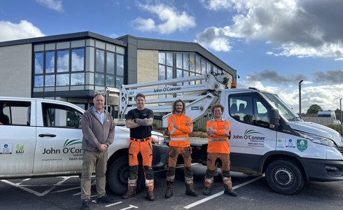 Team members from John O'Conner Abriculture outside Wiltshire Air Ambulance's airbase