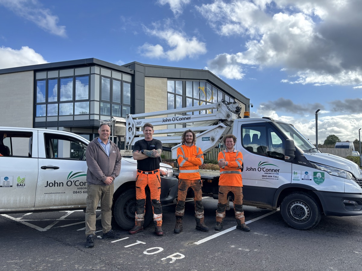 Team members from John O'Conner Abriculture outside Wiltshire Air Ambulance's airbase