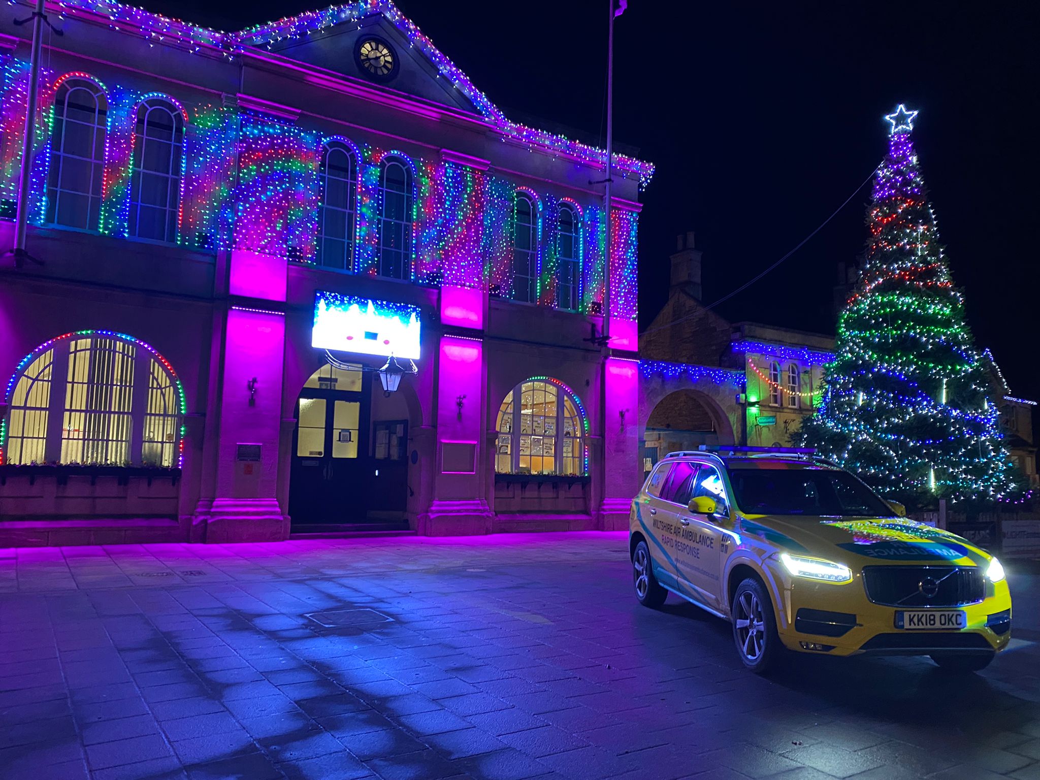 Wiltshire Air Ambulance's critical care car parked outside Melksham Town Hall at Christmas