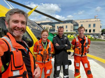 Dr Reuben with critical care paramedic Sophie Holt, pilot Simon Gough and critical care paramedic Craig Wilkins at a hospital helipad. Dr Reuben with critical care paramedic Sophie Holt, pilot Simon Gough and critical care paramedic Craig Wilkins at a hospital helipad.