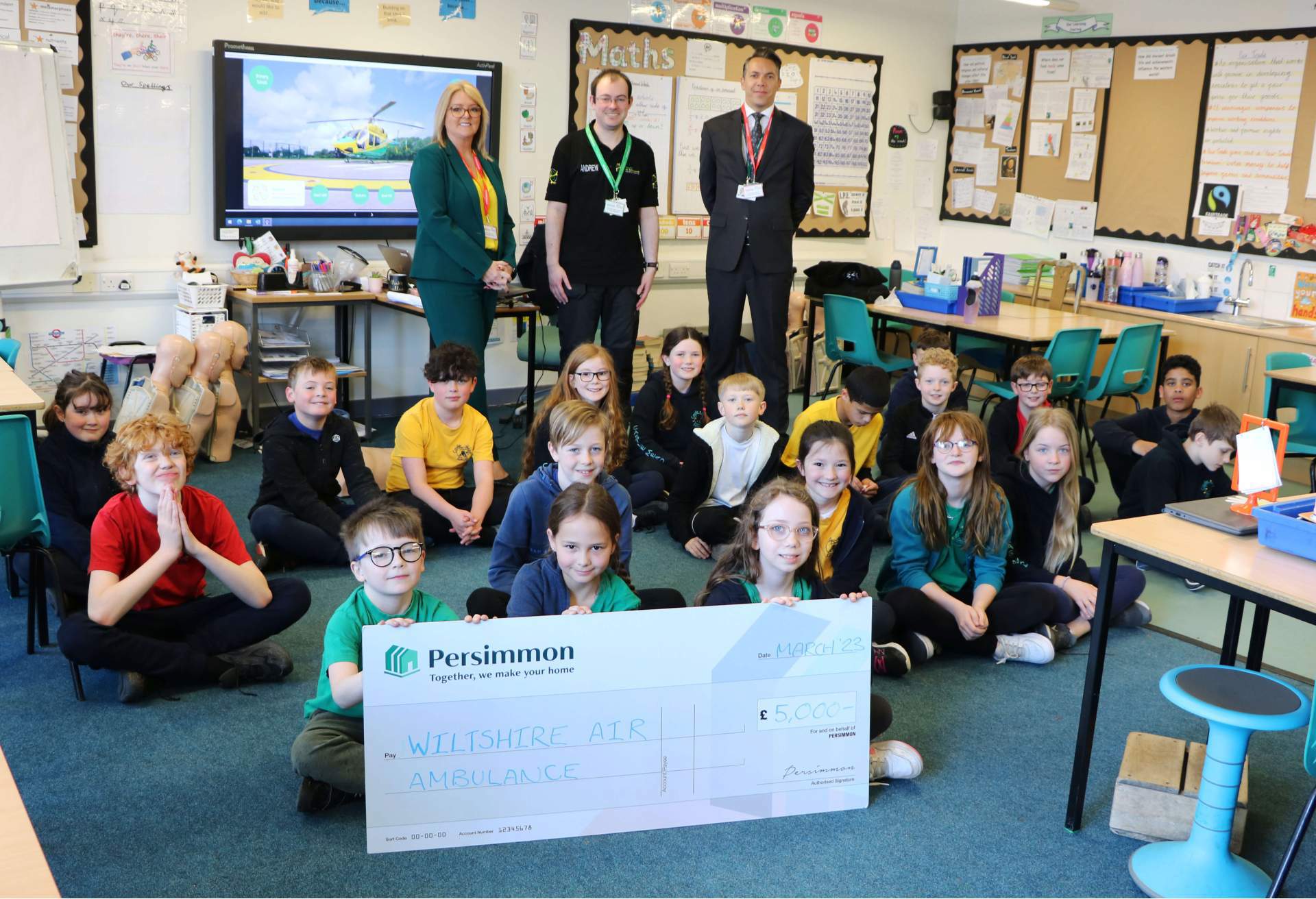 Persimmon Homes Wessex hand over a £5,000 cheque to Wiltshire Air Ambulance at Castle Mead School, Trowbridge Persimmon Homes Wessex hand over a £5,000 cheque to Wiltshire Air Ambulance at Castle Mead School, Trowbridge