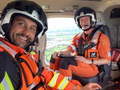 Critical care paramedics Adam Khan and Craig Wilkins taking a selfie mid-flight in the Wiltshire Air Ambulance helicopter. Critical care paramedics Adam Khan and Craig Wilkins taking a selfie mid-flight in the Wiltshire Air Ambulance helicopter.