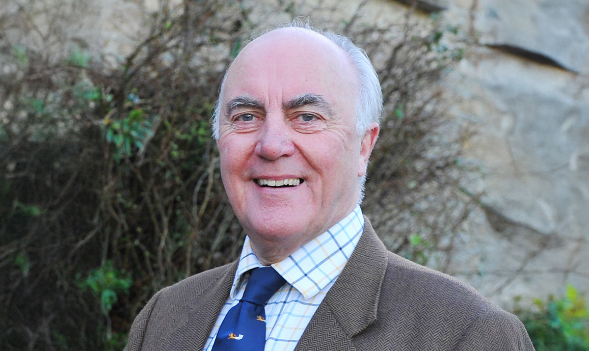 A headshot of Richard Youens stood outside A headshot of Richard Youens stood outside
