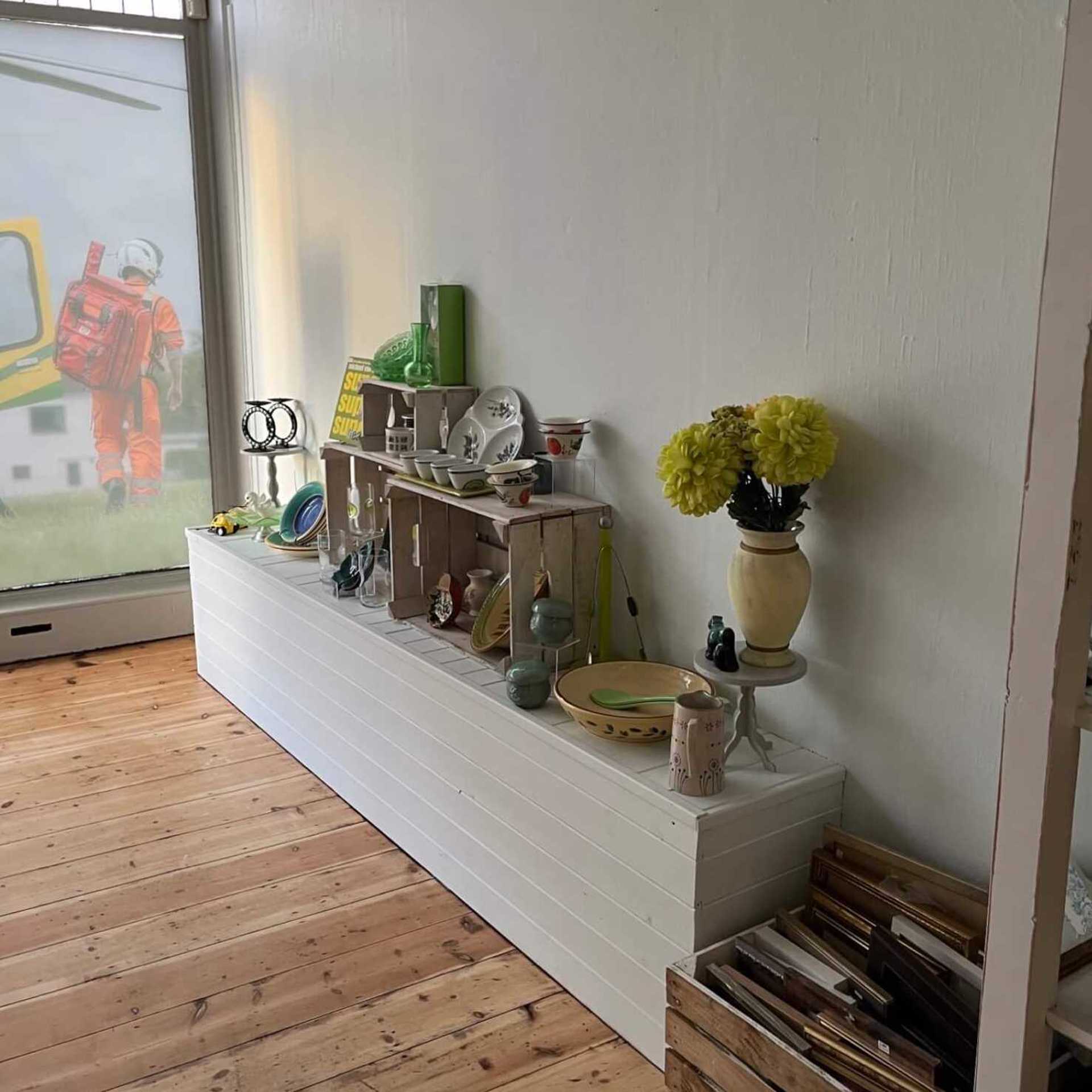 New display units painted in white at the charity shop in Devizes. New display units painted in white at the charity shop in Devizes.